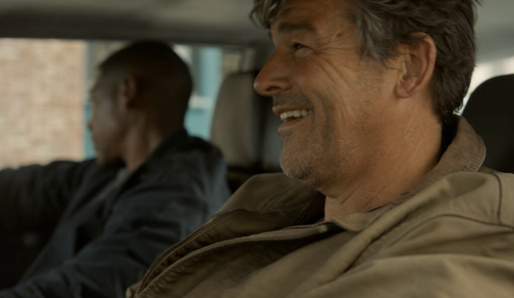 Hal Jordan driving with John Stewart